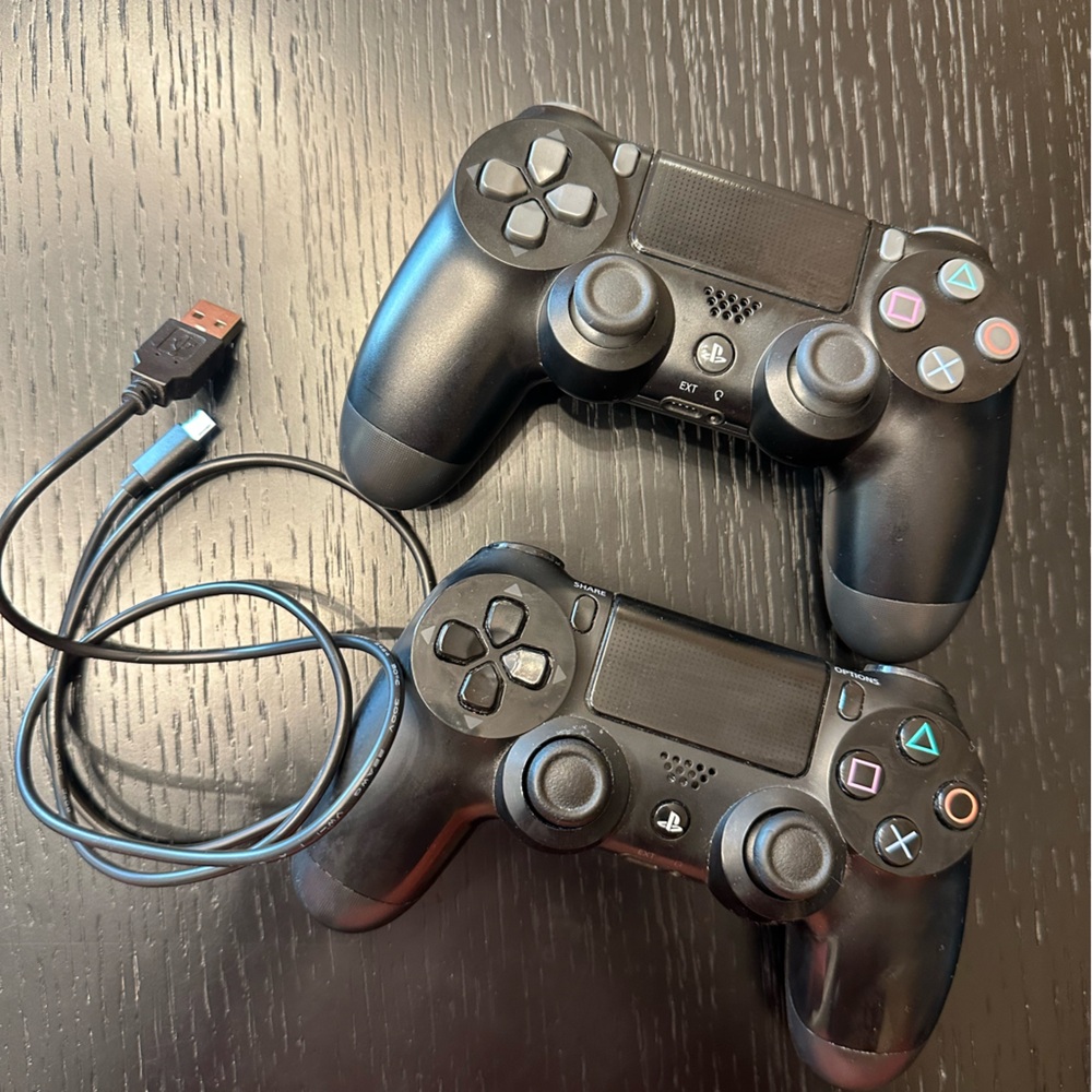 Two Dualshock Game Controllers for PlayStation 4 - Black